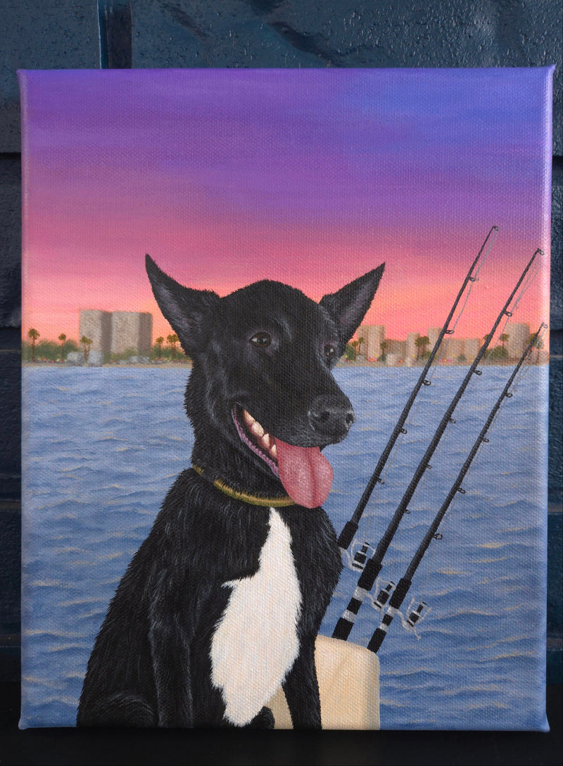 Painting of a black and white dog with fishing rods on a beach at sunset.