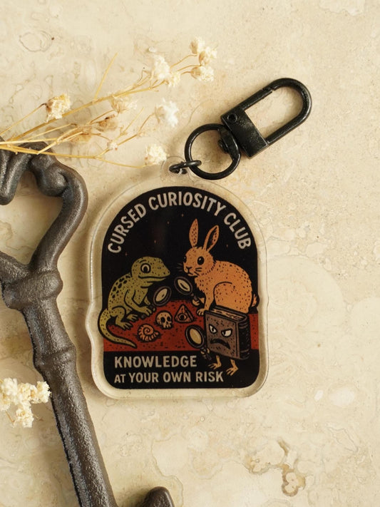Cursed Curiosity Club Acrylic Keychain