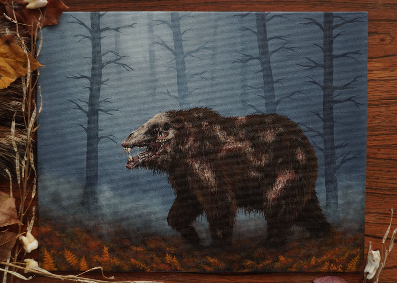 Mutant Bear painting on a wooden surface with natural elements