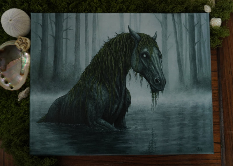 Dark kelpie horse in a swamp scene with mist on a wooden surface